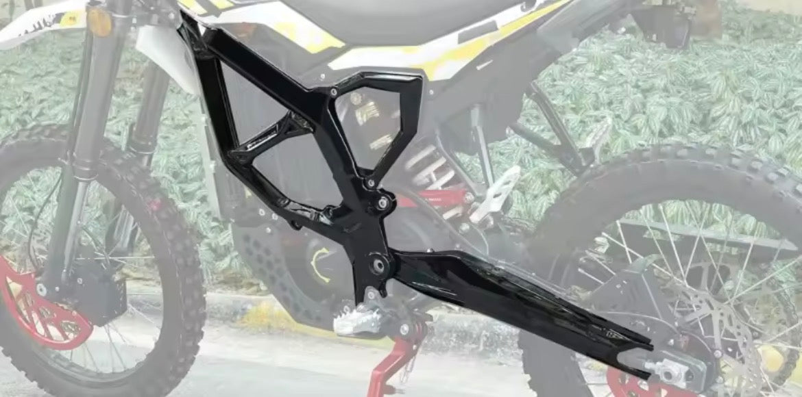 Surron Ultra Bee protective cover kit showing a high-impact body frame armor for off-road riding.