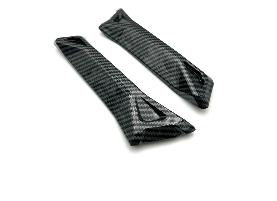 carbon fiber battery guards for Surron Ultra Bee, featuring sleek carbon weave design for optimal protection.