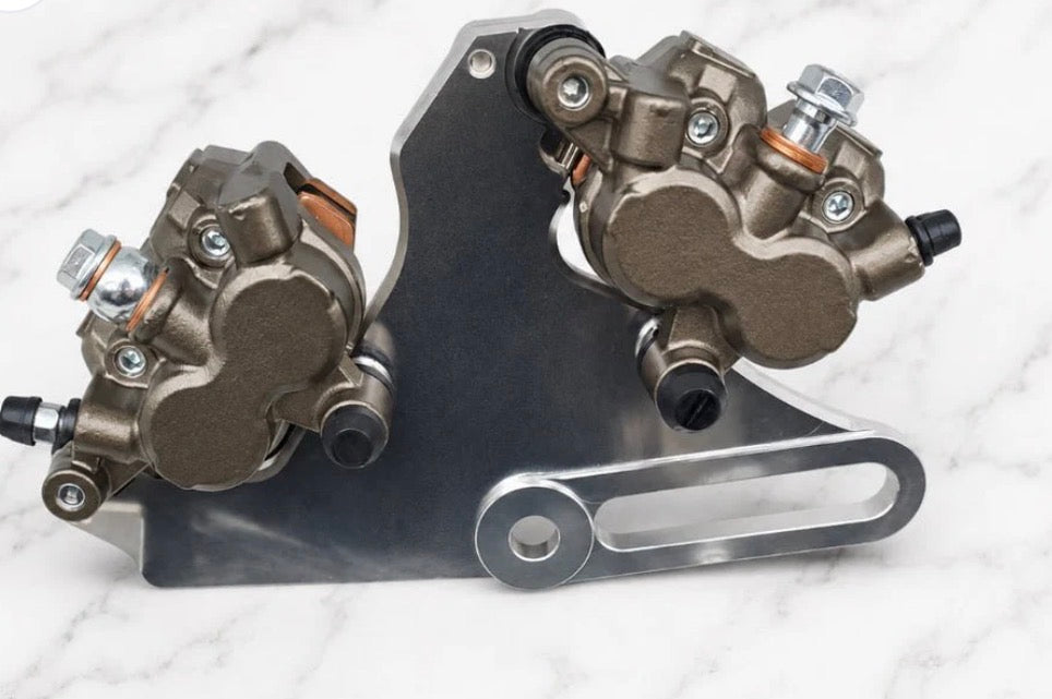 Tuttio foot brake kit featuring precision-machined components for enhanced braking performance.
