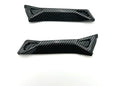 carbon fiber battery guards for Surron Ultra Bee showcasing high-gloss finish and aggressive styling.