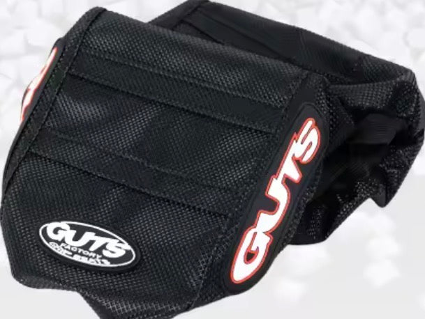 Surron Ultra Bee seat cover by GUTS Racing featuring a durable, ribbed design for superior grip and control.
