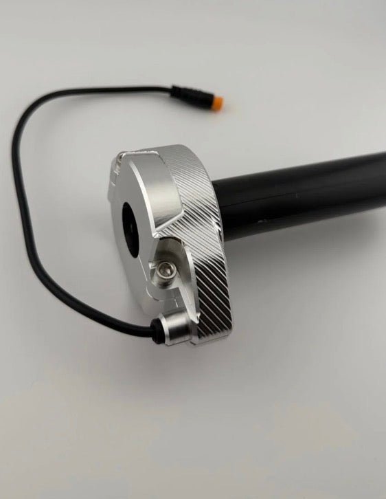 CNC aluminum throttle for e-bikes with a sleek design and pre-wired connector for easy installation.
