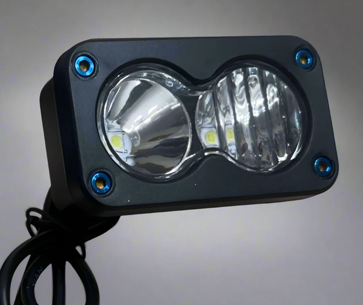 Baja light featuring burnt blue titanium bolts for secure and stylish mounting.