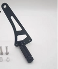 Eride foot lock in black, designed for maximum grip and stability for stunt riding with included mounting hardware.