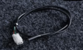 Surron Light Bee brake cutoff switch showing a Plug-and-Play Magnetic Brake Sensor Cable for customization.